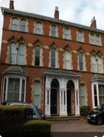 Ear Wax Specialist Birmingham logo with stylised ear design.