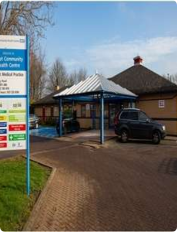Building with signage for Midlands Clinic and Greet Medical Practice